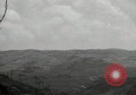 Image of explosions on hill Okinawa Ryukyu Islands, 1945, second 43 stock footage video 65675074417