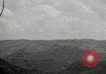 Image of explosions on hill Okinawa Ryukyu Islands, 1945, second 47 stock footage video 65675074417