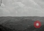 Image of explosions on hill Okinawa Ryukyu Islands, 1945, second 49 stock footage video 65675074417