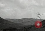 Image of explosions on hill Okinawa Ryukyu Islands, 1945, second 60 stock footage video 65675074417