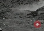 Standbild Explosionen Okinawa Ryukyu Inseln, 1945, aus Sekunde 11 historischem Filmmaterial Videoclip 65675074418