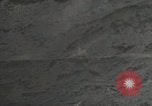 Standbild Explosionen Okinawa Ryukyu Inseln, 1945, aus Sekunde 19 historischem Filmmaterial Videoclip 65675074418