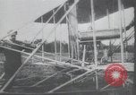 Image of Theodore Roosevelt flying with Wright pilot Archibald Hoxsey United States USA, 1910, second 1 stock footage video 65675074471