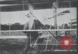 Image of Theodore Roosevelt flying with Wright pilot Archibald Hoxsey United States USA, 1910, second 4 stock footage video 65675074471