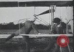 Image of Theodore Roosevelt flying with Wright pilot Archibald Hoxsey United States USA, 1910, second 7 stock footage video 65675074471