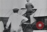 Image of Theodore Roosevelt flying with Wright pilot Archibald Hoxsey United States USA, 1910, second 62 stock footage video 65675074471
