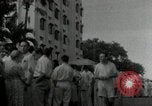 Immagine di Le persone schierate Filippine, 1942, secondo 11 filmato di repertorio 65675074518