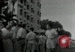 Immagine di Le persone schierate Filippine, 1942, secondo 12 filmato di repertorio 65675074518