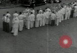 Immagine di Le persone schierate Filippine, 1942, secondo 23 filmato di repertorio 65675074518