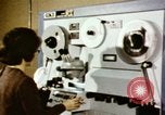 Image of User of early computers by American government workers United States USA, 1968, second 3 stock footage video 65675074553