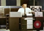 Image of User of early computers by American government workers United States USA, 1968, second 6 stock footage video 65675074553