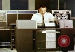 Image of User of early computers by American government workers United States USA, 1968, second 7 stock footage video 65675074553