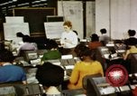 Image of User of early computers by American government workers United States USA, 1968, second 23 stock footage video 65675074553