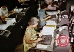 Image of User of early computers by American government workers United States USA, 1968, second 33 stock footage video 65675074553