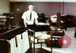 Image of User of early computers by American government workers United States USA, 1968, second 56 stock footage video 65675074553