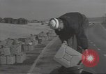 Image of U.S. sailor filling fuel tank prior to D-Day in World War II Portland England United Kingdom, 1944, second 3 stock footage video 65675074622