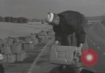 Image of U.S. sailor filling fuel tank prior to D-Day in World War II Portland England United Kingdom, 1944, second 4 stock footage video 65675074622