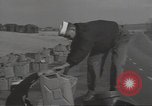 Image of U.S. sailor filling fuel tank prior to D-Day in World War II Portland England United Kingdom, 1944, second 6 stock footage video 65675074622
