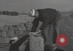 Image of U.S. sailor filling fuel tank prior to D-Day in World War II Portland England United Kingdom, 1944, second 7 stock footage video 65675074622