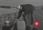 Image of U.S. sailor filling fuel tank prior to D-Day in World War II Portland England United Kingdom, 1944, second 8 stock footage video 65675074622