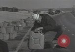 Image of U.S. sailor filling fuel tank prior to D-Day in World War II Portland England United Kingdom, 1944, second 9 stock footage video 65675074622