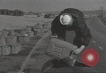 Image of U.S. sailor filling fuel tank prior to D-Day in World War II Portland England United Kingdom, 1944, second 11 stock footage video 65675074622