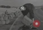 Image of U.S. sailor filling fuel tank prior to D-Day in World War II Portland England United Kingdom, 1944, second 15 stock footage video 65675074622