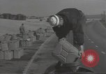 Image of U.S. sailor filling fuel tank prior to D-Day in World War II Portland England United Kingdom, 1944, second 16 stock footage video 65675074622