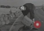 Image of U.S. sailor filling fuel tank prior to D-Day in World War II Portland England United Kingdom, 1944, second 17 stock footage video 65675074622