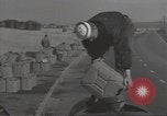 Image of U.S. sailor filling fuel tank prior to D-Day in World War II Portland England United Kingdom, 1944, second 18 stock footage video 65675074622