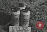 Image of U.S. sailor filling fuel tank prior to D-Day in World War II Portland England United Kingdom, 1944, second 33 stock footage video 65675074622