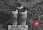 Image of U.S. sailor filling fuel tank prior to D-Day in World War II Portland England United Kingdom, 1944, second 34 stock footage video 65675074622