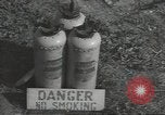 Image of U.S. sailor filling fuel tank prior to D-Day in World War II Portland England United Kingdom, 1944, second 37 stock footage video 65675074622
