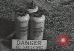 Image of U.S. sailor filling fuel tank prior to D-Day in World War II Portland England United Kingdom, 1944, second 38 stock footage video 65675074622