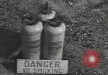 Image of U.S. sailor filling fuel tank prior to D-Day in World War II Portland England United Kingdom, 1944, second 40 stock footage video 65675074622