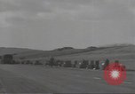 Image of U.S. sailor filling fuel tank prior to D-Day in World War II Portland England United Kingdom, 1944, second 52 stock footage video 65675074622