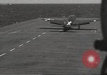 Image of Marine F4U Corsairs of VMF-112 Pacific Theater, 1945, second 48 stock footage video 65675074656