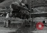 Image of USAAC mechanics perform maintenance on P-40 and P-400 airplanes Guadalcanal Solomon Islands, 1943, second 11 stock footage video 65675074690