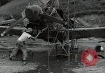 Image of USAAC mechanics perform maintenance on P-40 and P-400 airplanes Guadalcanal Solomon Islands, 1943, second 17 stock footage video 65675074690