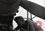 Image of USAAC mechanics perform maintenance on P-40 and P-400 airplanes Guadalcanal Solomon Islands, 1943, second 27 stock footage video 65675074690