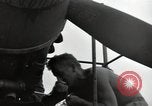 Image of USAAC mechanics perform maintenance on P-40 and P-400 airplanes Guadalcanal Solomon Islands, 1943, second 28 stock footage video 65675074690