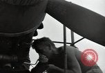 Image of USAAC mechanics perform maintenance on P-40 and P-400 airplanes Guadalcanal Solomon Islands, 1943, second 29 stock footage video 65675074690