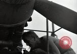 Image of USAAC mechanics perform maintenance on P-40 and P-400 airplanes Guadalcanal Solomon Islands, 1943, second 30 stock footage video 65675074690
