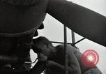 Image of USAAC mechanics perform maintenance on P-40 and P-400 airplanes Guadalcanal Solomon Islands, 1943, second 31 stock footage video 65675074690