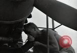 Image of USAAC mechanics perform maintenance on P-40 and P-400 airplanes Guadalcanal Solomon Islands, 1943, second 32 stock footage video 65675074690