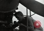 Image of USAAC mechanics perform maintenance on P-40 and P-400 airplanes Guadalcanal Solomon Islands, 1943, second 33 stock footage video 65675074690