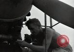 Image of USAAC mechanics perform maintenance on P-40 and P-400 airplanes Guadalcanal Solomon Islands, 1943, second 34 stock footage video 65675074690