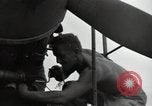 Image of USAAC mechanics perform maintenance on P-40 and P-400 airplanes Guadalcanal Solomon Islands, 1943, second 35 stock footage video 65675074690