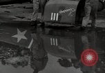 Image of USAAC mechanics perform maintenance on P-40 and P-400 airplanes Guadalcanal Solomon Islands, 1943, second 39 stock footage video 65675074690