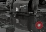 Image of USAAC mechanics perform maintenance on P-40 and P-400 airplanes Guadalcanal Solomon Islands, 1943, second 40 stock footage video 65675074690